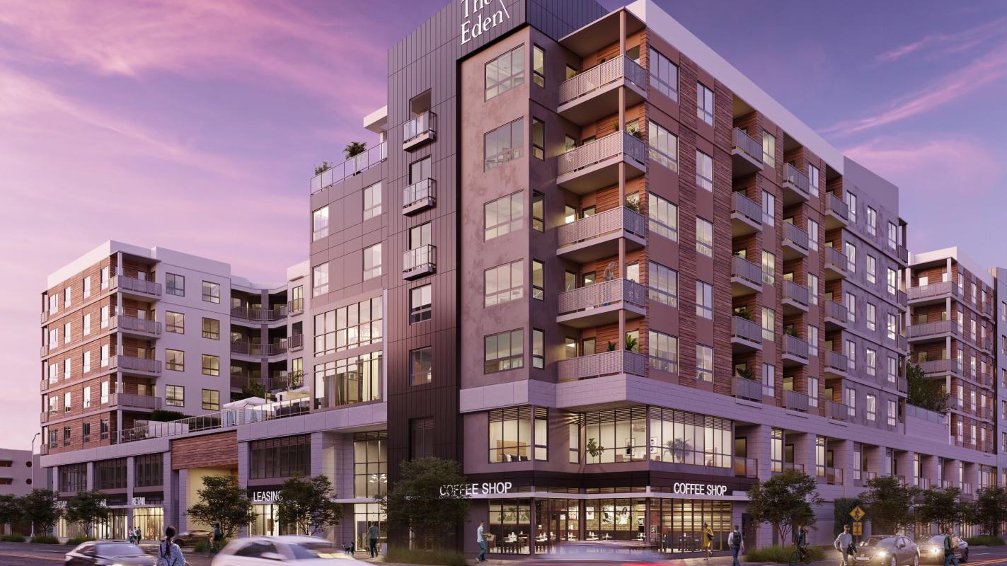 Mixed-use apartment building unwrapped at 1340 S. Hill